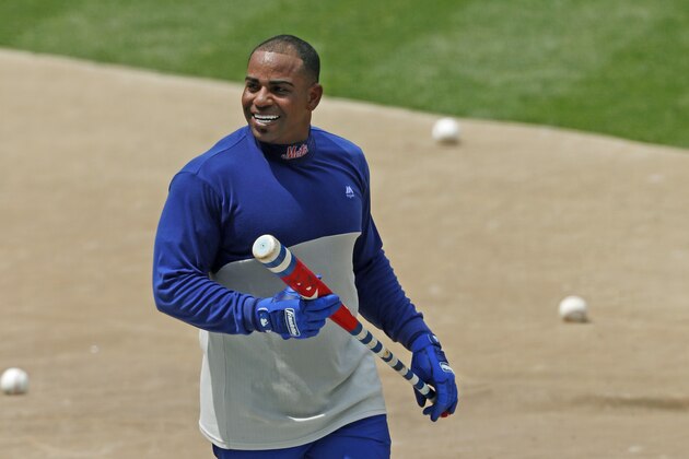 New York Mets Yoenis Cespedes smiles as he leaves the cage after taking batting practice during a summer baseball training camp workout at Citi Field, Wednesday, July 22, 2020, in New York. (AP Photo/Kathy Willens)