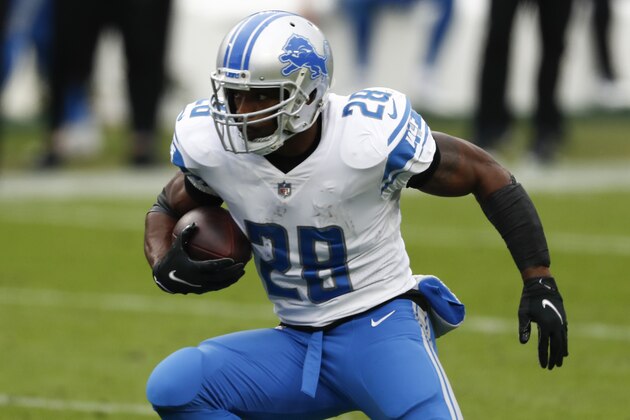 Detroit Lions running back Adrian Peterson runs against the Tennessee Titans during the first half of an NFL football game Sunday, Dec. 20, 2020, in Nashville, Tenn. (AP Photo/Wade Payne)