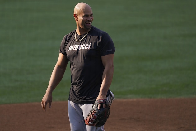 Los Angeles Angels first baseman Albert Pujols smiles during batting practice before the team's baseball game against the Los Angeles Dodgers on Saturday, Sept. 26, 2020, in Los Angeles. (AP Photo/Ashley Landis)