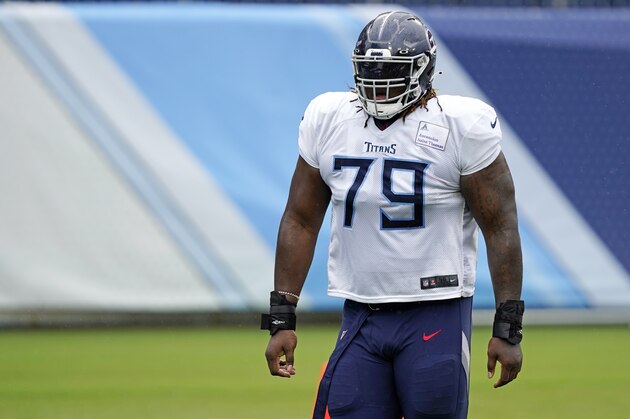 Tennessee Titans offensive tackle Isaiah Wilson waits for his turn to run a drill during NFL football training camp Friday, Aug. 21, 2020, in Nashville, Tenn. (AP Photo/Mark Humphrey)