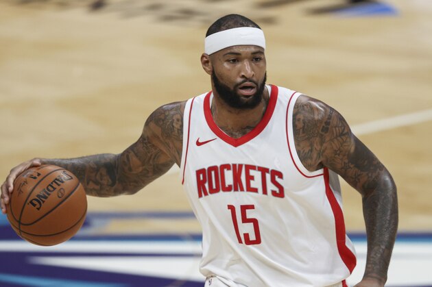Houston Rockets center DeMarcus Cousins brings the ball up court against the Charlotte Hornets in the first half of an NBA basketball game in Charlotte, N.C., Monday, Feb. 8, 2021. (AP Photo/Nell Redmond)