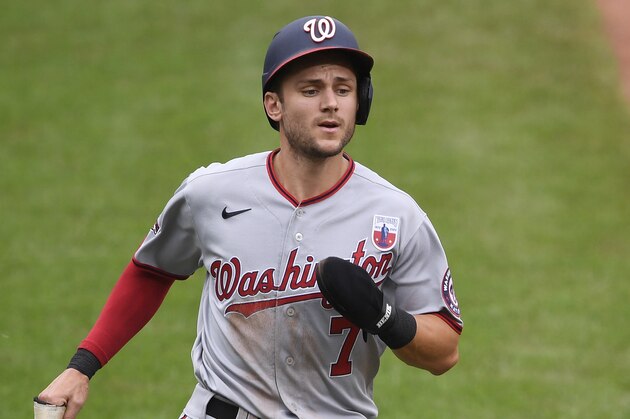 Washington Nationals' Trea Turner runs home to score on a single by Asdrubal Cabrera during the first inning of a baseball game against the Baltimore Orioles, Sunday, Aug. 16, 2020, in Baltimore. (AP Photo/Nick Wass)