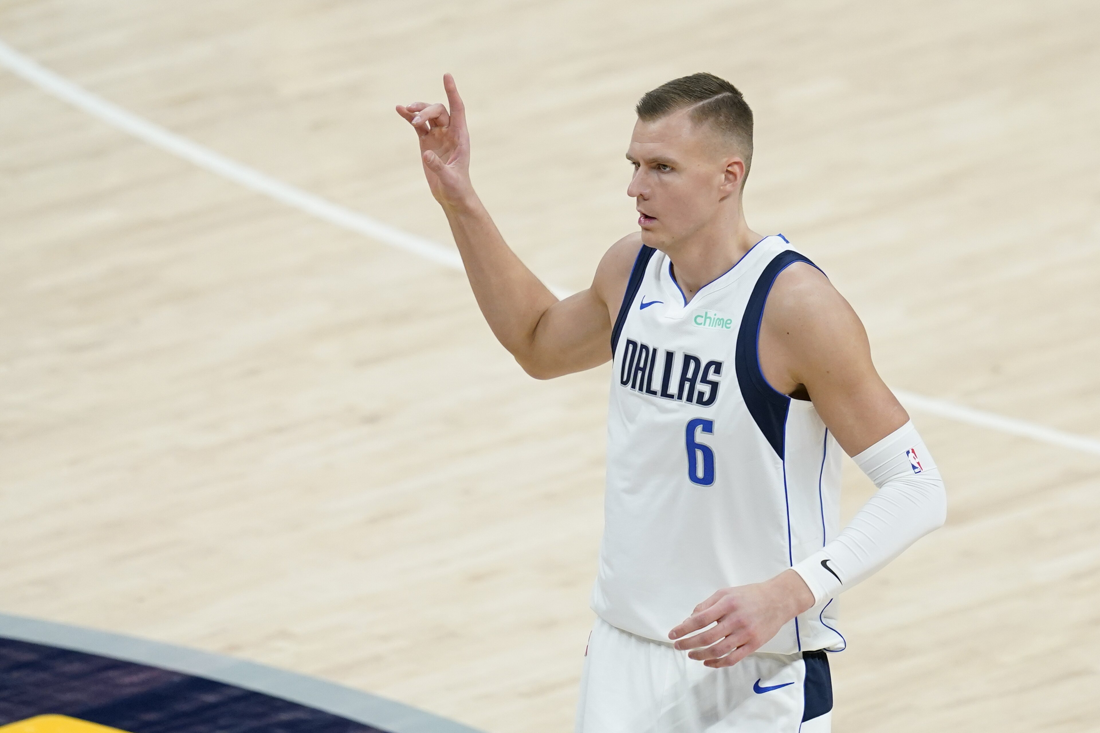 Dallas Mavericks' Kristaps Porzingis (6) reacts after hitting a shot during the second half of an NBA basketball game against the Indiana Pacers, Wednesday, Jan. 20, 2021, in Indianapolis. (AP Photo/Darron Cummings) Dallas Mavericks' Kristaps Porzingis (6) reacts after hitting a shot during the second half of an NBA basketball game against the Indiana Pacers, Wednesday, Jan. 20, 2021, in Indianapolis. (AP Photo/Darron Cummings)