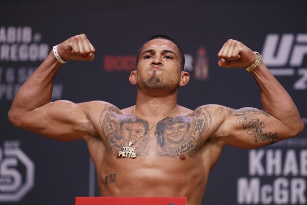 FILE  - Anthony Pettis poses during a ceremonial weigh-in for the UFC 229 mixed martial arts fight Friday, Oct. 5, 2018, in Las Vegas. The Professional Fighters League says it has raised $65 million in new financing to boost its expansion and growth. The mixed martial arts promotion announced in a statement Thursday, Feb. 18, 2021 that the money will go toward talent acquisition and international expansion. (AP Photo/John Locher, file)