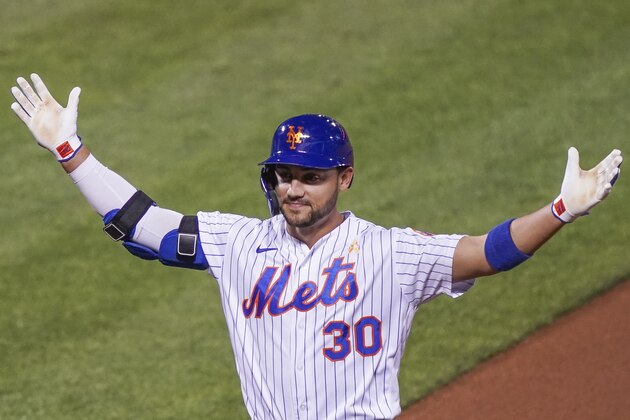 New York Mets' Michael Conforto reacts after hitting an RBI single off Philadelphia Phillies starting pitcher Spencer Howard during the third inning of a baseball game, Saturday, Sept. 5, 2020, in New York. (AP Photo/John Minchillo)