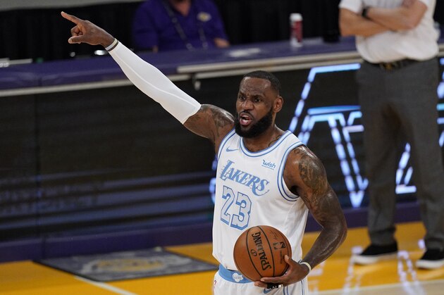 Los Angeles Lakers forward LeBron James gestures during the first half of an NBA basketball game against the Washington Wizards Monday, Feb. 22, 2021, in Los Angeles. (AP Photo/Mark J. Terrill)