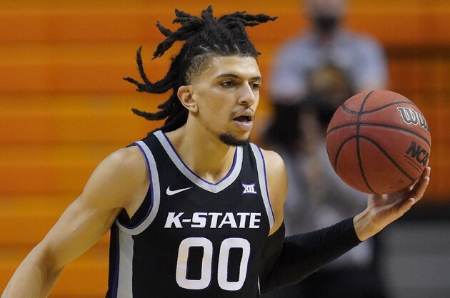 Kansas State guard Mike McGuirl during of an NCAA college basketball game against Oklahoma State, Saturday, Feb. 13, 2021, in Stillwater, Okla. (AP Photo/Sue Ogrocki)