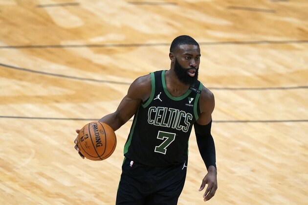 Boston Celtics guard Jaylen Brown (7) advances the ball up court in the second half of an NBA basketball game against the New Orleans Pelicans in New Orleans, Sunday, Feb. 21, 2021. (AP Photo/Gerald Herbert)