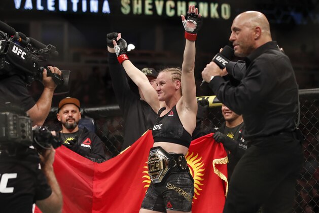Valentina Shevchenko celebrates after defeating Jessica Eye during their women's flyweight title mixed martial arts bout at UFC 238, Saturday, June 8, 2019, in Chicago. (AP Photo/Kamil Krzaczynski)