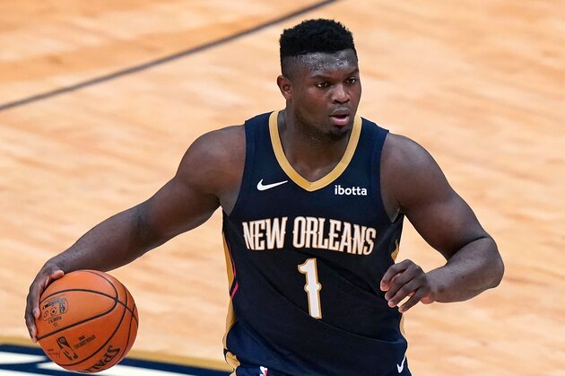 New Orleans Pelicans forward Zion Williamson (1) moves the ball up court in the second half of an NBA basketball game against the Portland Trail Blazers in New Orleans, Wednesday, Feb. 17, 2021. (AP Photo/Gerald Herbert)