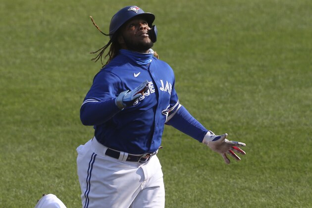 Toronto Blue Jays Vladimir Guerrero Jr. celebrates his home run against Baltimore Orioles pitcher Keegan Akin during the third inning of a baseball game, Sunday, Sept. 27, 2020, in Buffalo, N.Y. (AP Photo/Jeffrey T. Barnes)