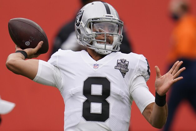 Las Vegas Raiders quarterback Marcus Mariota (8) in the first half of an NFL football game Sunday, Jan. 3, 2021, in Denver. (AP Photo/David Zalubowski)