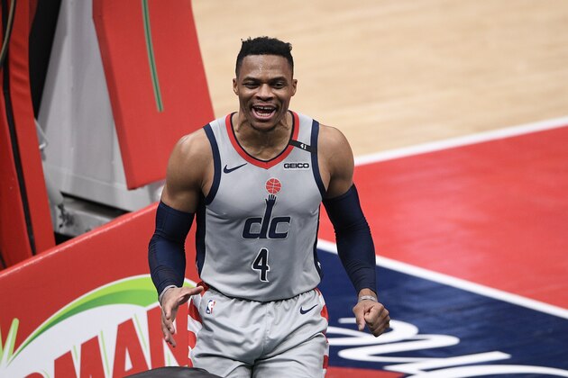 Washington Wizards guard Russell Westbrook (4) reacts after he scored and was fouled during the second half of an NBA basketball game against the Boston Celtics, Sunday, Feb. 14, 2021, in Washington. (AP Photo/Nick Wass)