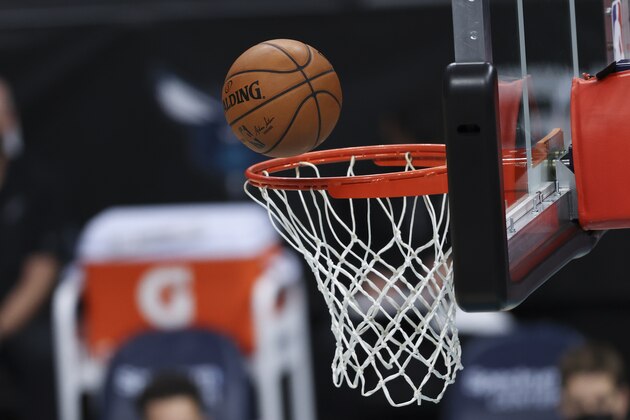 Basketball shot on the rim during an NBA basketball game between the Charlotte Hornets and the San Antonio Spurs in Charlotte, N.C., Sunday, Feb. 14, 2021. (AP Photo/Nell Redmond)