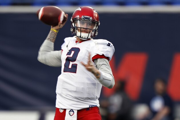 FILE- In this March 24, 2019, file photo, Memphis Express quarterback Johnny Manziel warms up before an AAF football game against the Birmingham Iron in Memphis, Tenn. After a self-destructing pro career that never close to matching his enormous potential, Manziel says he's done with the game that gave him his catchy moniker (Johnny Football), even as he's dabbling in a fledgling, fan-controlled arena league that was set to begin play Saturday night in suburban Atlanta.  (AP Photo/Wade Payne, File)
