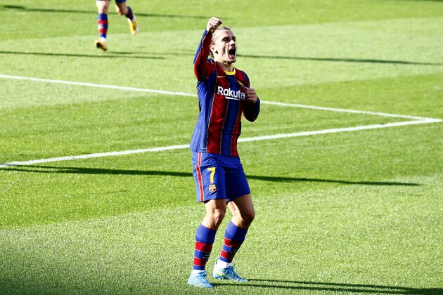 Barcelona's Antoine Griezmann celebrates after scoring his side's second goal during the Spanish La Liga soccer match between FC Barcelona and Osasuna at the Camp Nou stadium in Barcelona, Spain, Sunday, Nov. 29, 2020. (AP Photo/Joan Monfort)