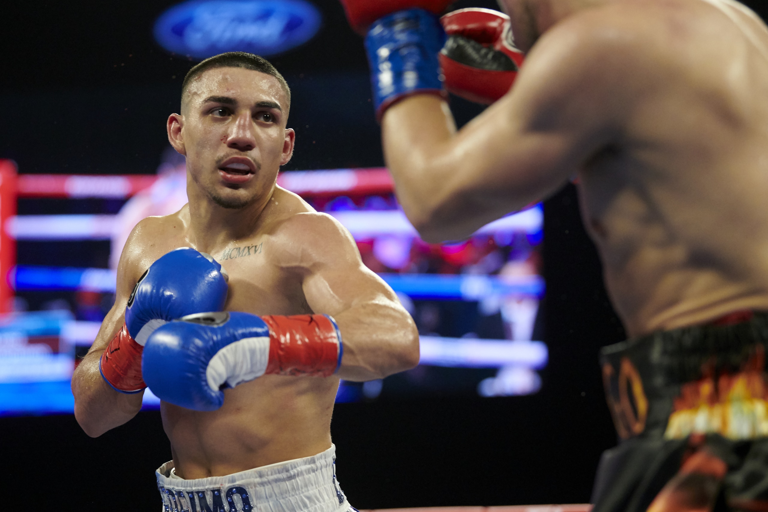 Teofimo Lopez, left, faces off against Diego Magdaleno during a lightweight boxing match, Saturday, Feb. 2, 2019, in Frisco, Texas. (AP Photo/Cooper Neill)