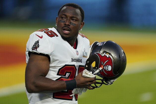 Tampa Bay Buccaneers running back LeSean McCoy (25) looks on before the NFL Super Bowl 55 football game against the Kansas City Chiefs, Sunday, Feb. 7, 2021, in Tampa, Fla. The Tampa Bay Buccaneers defeated the Kansas City Chiefs 31-9. (AP Photo/Steve Luciano)