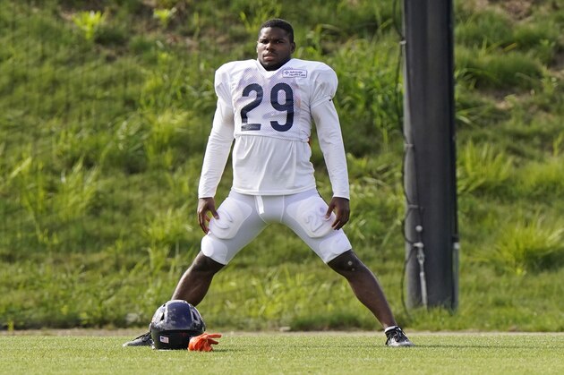 Chicago Bears running back Tarik Cohen warms up during an NFL football camp practice in Lake Forest, Ill., Tuesday, Aug. 18, 2020. (AP Photo/Nam Y. Huh)