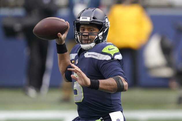 Seattle Seahawks quarterback Russell Wilson (3) in action against the Los Angeles Rams during an NFL wild-card playoff football game, Saturday, Jan. 9, 2021, in Seattle. (AP Photo/Ted S. Warren)