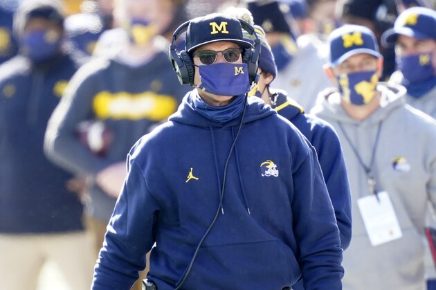 Michigan head coach Jim Harbaugh is seen during the first half of an NCAA college football game, Saturday, Oct. 31, 2020, in Ann Arbor, Mich. (AP Photo/Carlos Osorio)