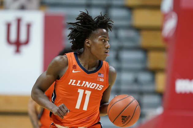 Illinois' Ayo Dosunmu (11) dribbles during the first half of an NCAA college basketball game against Indiana, Tuesday, Feb. 2, 2021, in Bloomington, Ind. (AP Photo/Darron Cummings)