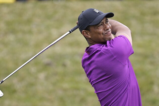 Tiger Woods watches his tee shot on the 17th hole during the first round of the PNC Championship golf tournament, Saturday, Dec. 19, 2020, in Orlando, Fla. (AP Photo/Phelan M. Ebenhack)