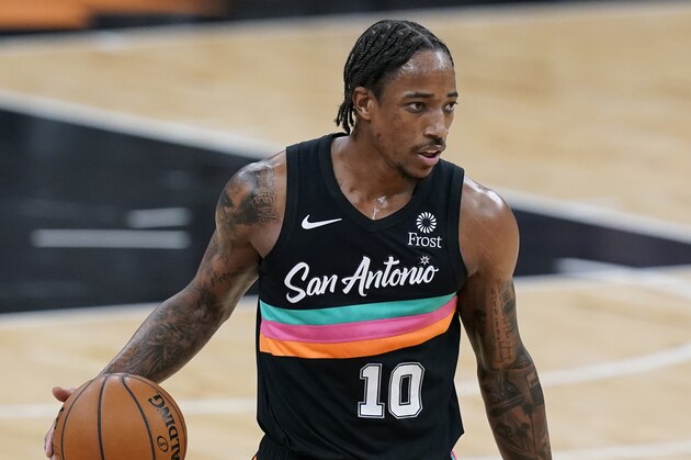 San Antonio Spurs forward DeMar DeRozan (10) during the first half of an NBA basketball game against the Golden State Warriors in San Antonio, Tuesday, Feb. 9, 2021. (AP Photo/Eric Gay)