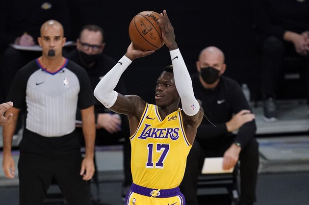 Los Angeles Lakers guard Dennis Schroder (17) takes a shot during the first quarter of an NBA basketball game against the Oklahoma City Thunder Wednesday, Feb. 10, 2021, in Los Angeles. (AP Photo/Ashley Landis)
