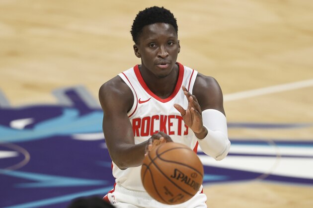 Houston Rockets guard Victor Oladipo passes against the Charlotte Hornets in the first half of an NBA basketball game in Charlotte, N.C., Monday, Feb. 8, 2021. (AP Photo/Nell Redmond)
