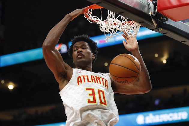 Atlanta Hawks center Damian Jones (30) dunks in the second half of an NBA basketball game against the Boston Celtics on Monday, Feb. 3, 2020, in Atlanta. (AP Photo/Todd Kirkland)