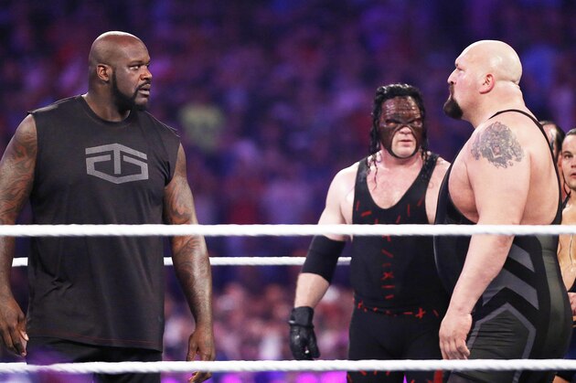 IMAGE DISTRIBUTED FOR WWE - NBA legend Shaquille O'Neal, left, faces off with WWE superstar The Big Show at WWE WrestleMania 32 at AT&T Stadium on Sunday, April 3, 2016, in Arlington, Texas. (Brandon Wade/AP Images for WWE)