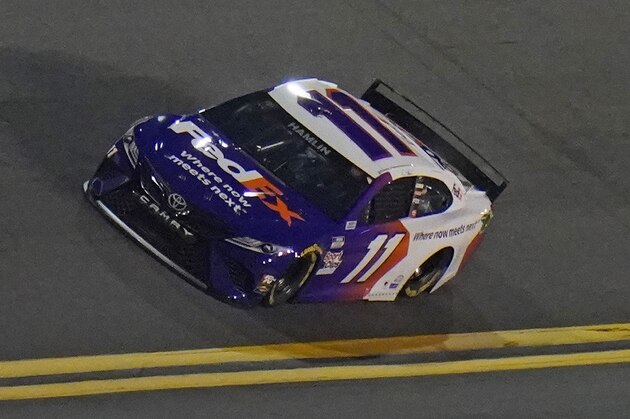 Denny Hamlin (11) runs during a NASCAR Daytona 500 qualifying session Wednesday, Feb. 10, 2021, at Daytona International Speedway in Daytona Beach, Fla. (AP Photo/Chris O'Meara)