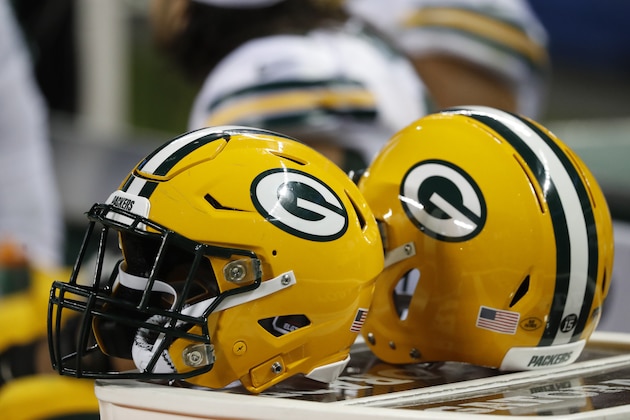 Some Green Bay Packers helmets are seen during the second half of an NFL football game against the Chicago Bears Thursday, Sept. 5, 2019, in Chicago. (AP Photo/Charles Rex Arbogast)