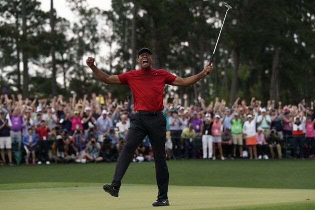 Tiger Woods reacts as he wins the Masters golf tournament Sunday, April 14, 2019, in Augusta, Ga. (AP Photo/David J. Phillip)
