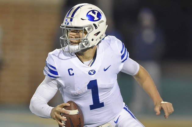 BYU quarterback Zach Wilson scrambles during the first half of an NCAA college football game against Coastal Carolina Saturday, Dec. 5, 2020, in Conway, S.C.Coastal Carolina won 22-17. (AP Photo/Richard Shiro)