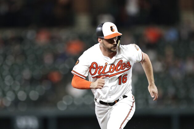 Baltimore Orioles' Trey Mancini moves to third base on a wild pitch during the third inning of a baseball game against the Toronto Blue Jays, Thursday, Sept. 19, 2019, in Baltimore. (AP Photo/Julio Cortez)