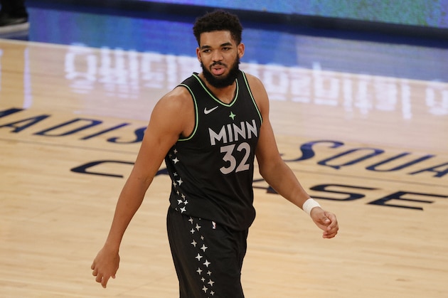 Minnesota Timberwolves' Karl-Anthony Towns reacts after a foul during the second half against the New York Knicks during an NBA basketball game Sunday, Feb. 21, 2021, in New York. (Sarah Stier/Pool Photo via AP)