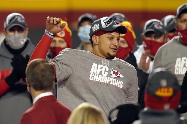 Kansas City Chiefs quarterback Patrick Mahomes celebrates with teammates after the AFC championship NFL football game against the Buffalo Bills, Sunday, Jan. 24, 2021, in Kansas City, Mo. The Chiefs won 38-24. (AP Photo/Charlie Riedel)