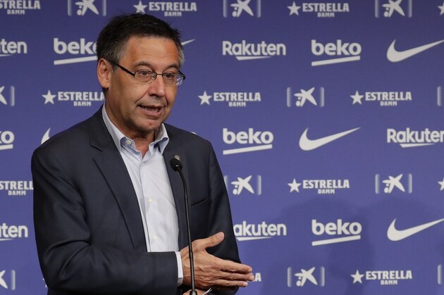 FC Barcelona's President Josep Maria Bartomeu, left, gives a speech during the official presentation of French forward Antoine Griezmann as new FC Barcelona player in Barcelona, Spain, Sunday, July 14, 2019. (AP Photo/Emilio Morenatti)