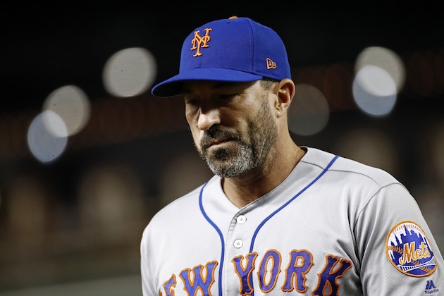 New York Mets manager Mickey Callaway walks off the field after relieving starting pitcher Jacob deGrom during a baseball game against the Washington Nationals, Tuesday, Sept. 3, 2019, in Washington. (AP Photo/Patrick Semansky)