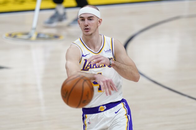 Los Angeles Lakers guard Alex Caruso (4) in the second half of an NBA basketball game Sunday, Feb. 14, 2021, in Denver. The Nuggegts won 122-105. (AP Photo/David Zalubowski)