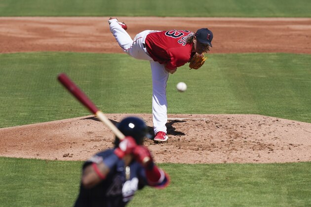 Boston Red Sox starting pitcher Garrett Richards throws in the first inning during a spring training baseball game against the Atlanta Braves on Monday, March 1, 2021, in Fort Myers, Fla. (AP Photo/Brynn Anderson)