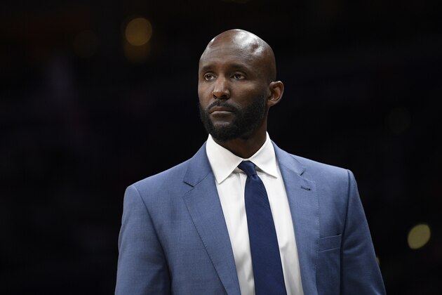 Atlanta Hawks head coach Lloyd Pierce looks on during the second half of an NBA basketball game against the Washington Wizards, Friday, March 6, 2020, in Washington. The Wizards won 118-112. (AP Photo/Nick Wass)