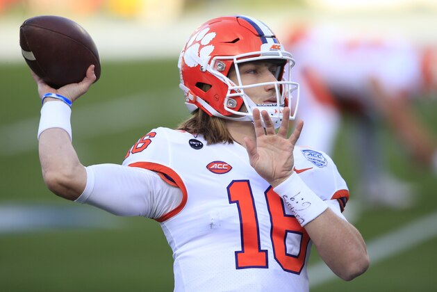 Clemson quarterback Trevor Lawrence (16) warms up before the start of the Atlantic Coast Conference championship NCAA college football game, Saturday, Dec. 19, 2020, in Charlotte, N.C. (AP Photo/Brian Blanco)