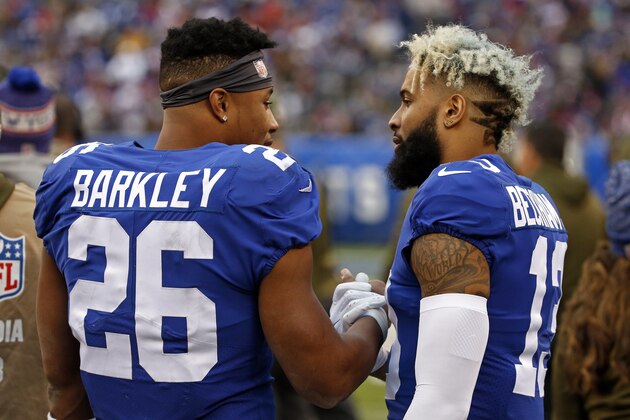 New York Giants running back Saquon Barkley (26) and Giants wide receiver Odell Beckham (13) on the sidelines against the Tampa Bay Buccaneers during an NFL football game Sunday, Nov. 18, 2018, in East Rutherford, N.J. (AP Photo/Adam Hunger)