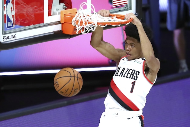 Portland Trail Blazers guard Anfernee Simons (1) dunks during the first half of an NBA basketball game against the Los Angeles Clippers Saturday, Aug. 8, 2020, in Lake Buena Vista, Fla. (Kim Klement/Pool Photo via AP)