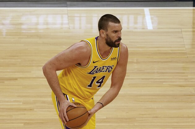 Los Angeles Lakers' Marc Gasol (14) plays in an NBA basketball game against the Minnesota Timberwolves, Tuesday, Feb. 16, 2021, in Minneapolis. (AP Photo/Jim Mone) Los Angeles Lakers' Marc Gasol (14) plays in an NBA basketball game against the Minnesota Timberwolves, Tuesday, Feb. 16, 2021, in Minneapolis. (AP Photo/Jim Mone)