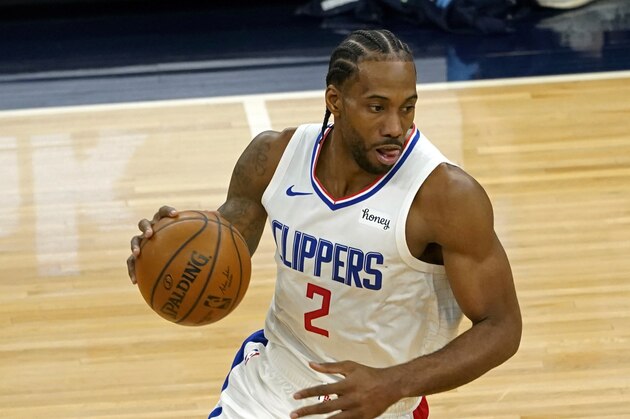 Los Angeles Clippers' Kawhi Leonard (2) plays against the Minnesota Timberwolves in an NBA basketball game, Wednesday, Feb. 10, 2021, in Minneapolis. (AP Photo/Jim Mone)