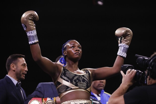 Claressa Shields stands for her introduction for a fight with Ivana Habazin in a women's 154-pound title boxing bout in Atlantic City, N.J., Friday, Jan. 10, 2020. (AP Photo/Matt Rourke)